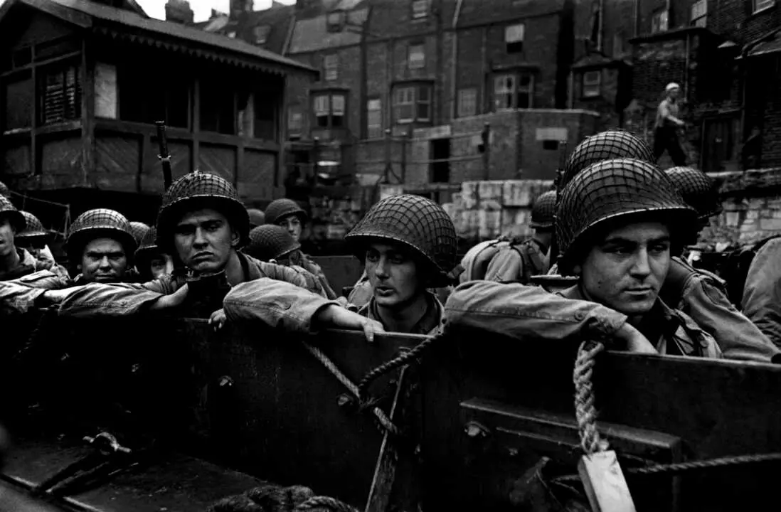 ENGLAND. W.W.II. Planning Operation Overlord.&nbsp;ENGLAND. Dorset. Weymouth. June 5, 1944. American troops in landing craft at Weymouth on their way to liberate France. Angleterre. Dorset. Weymouth. 5 juin 1944. Les troupes am&eacute;ricaines des Forces Alli&eacute;es quittent le port anglais de Weymouth. 
In June 1944 the Allied forces opened a second front in Normandy (after the one in North Africa and Italy) to liberate France. On June 6th, in what was later called D-Day, 90,000 soldiers landed on Omaha Beach (the coded name for Coleville-sur-Mer). Many of them were killed by German troops, but the Allies managed nonetheless to defeat the Germans. &copy; Robert Capa/Centro Internacional de Fotograf&iacute;a/Magnum Photos.