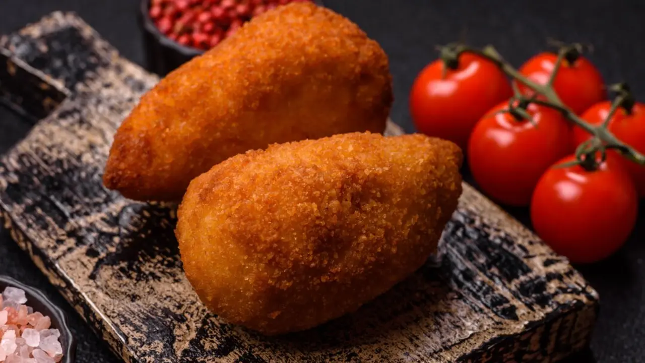Croquetas en imagen de archivo.