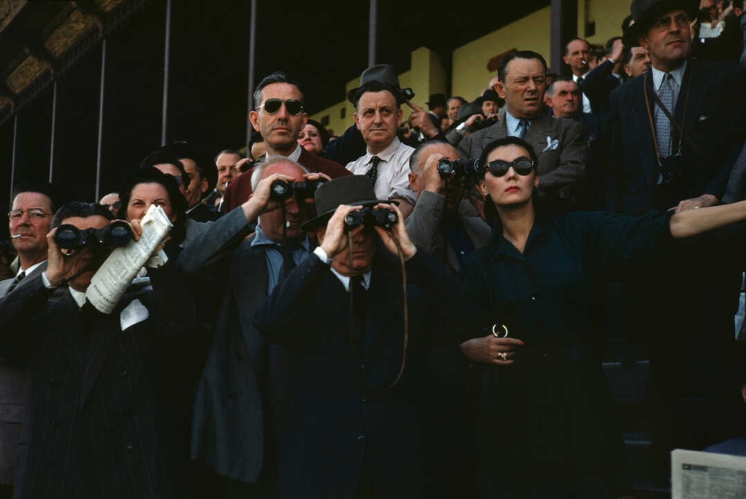 FRANCE. Paris. ca. 1952. Spectators at Longchamp Racecourse. © Robert Capa/Centro Internacional de Fotografía/Magnum Photos.